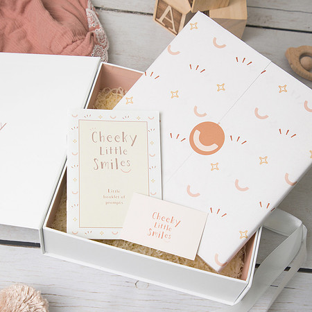 Baby journal photographed wrapped in a gift box
