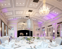 The interior of the ballroom at M Gallery Castle Hotel Windsor set up for a wedding