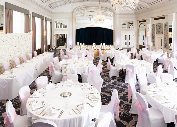 The inside of Castle Hotel Windsor's ballroom set up for a wedding reception
