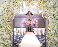 Castle Hotel in Windsor set up for a small wedding ceremony with flower arch