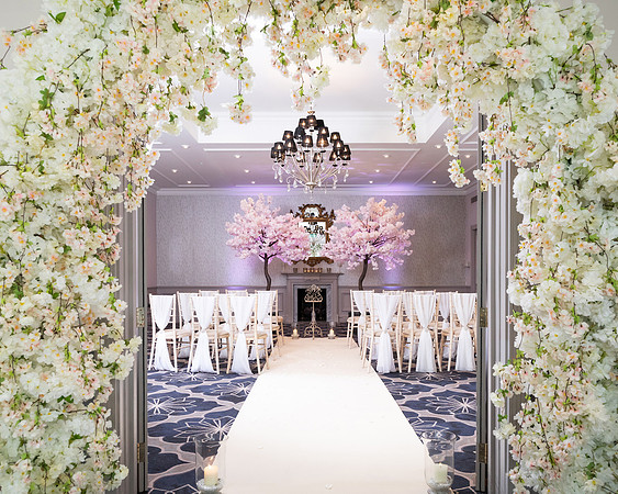 Castle Hotel in Windsor set up for a small wedding ceremony with flower arch