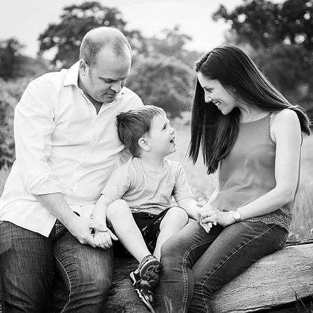 Family chat together during photoshoot