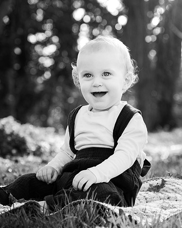Baby smiling during outdoor photoshoot