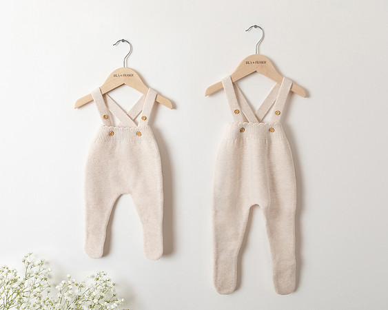 Children's clothing hanging on the wall