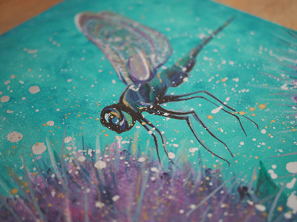 Dragonfly in the thistles - close up