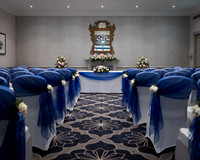 One of M Gallery Castle Hotel's rooms set up for a wedding ceremony