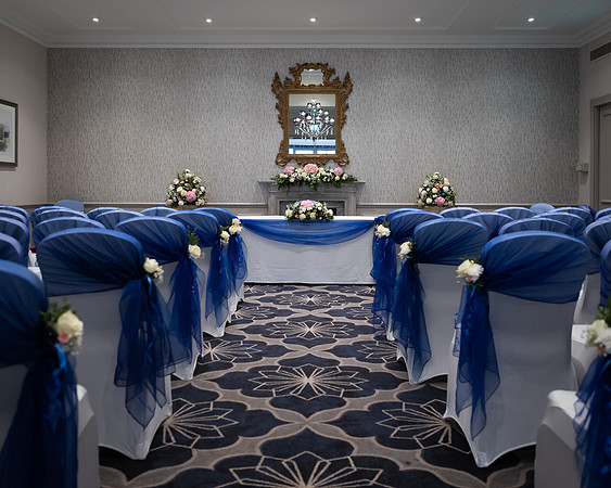One of M Gallery Castle Hotel's rooms set up for a wedding ceremony