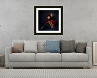 3D rendering of interior with sofa, coffee table and lamp, with framed photo of a brother and sister above the sofa