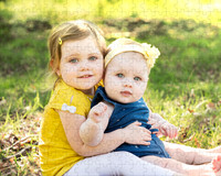 Photo of two young girls taken in summer, presented as a jigsaw