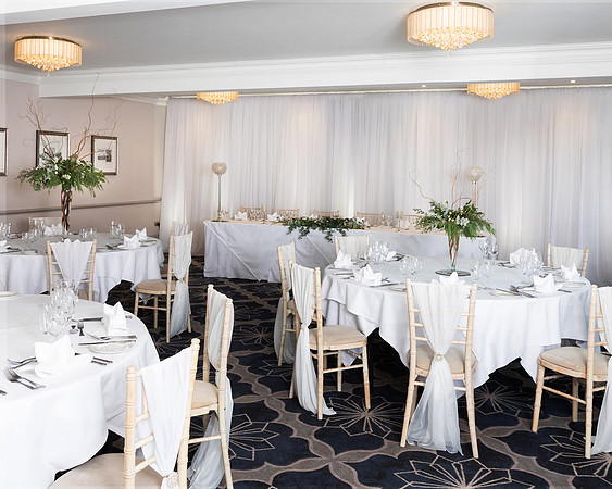 A room in Windsor's Castle Hotel set up for a small wedding reception