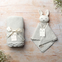 Baby blanket and baby comfort both knitted in grey yarn