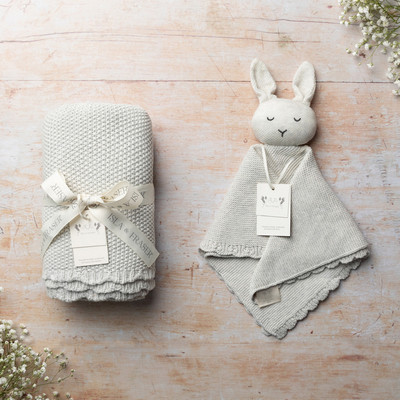 Baby blanket and baby comfort both knitted in grey yarn