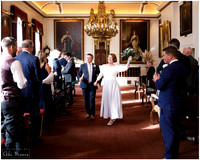 Bride & groom dance down the aisle together in Windsor Guildhall